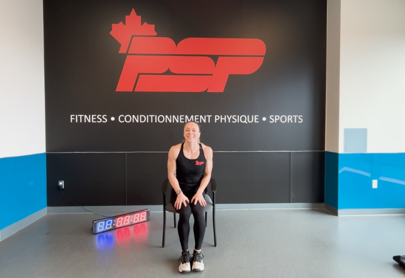 Fitness instructor doing exercise