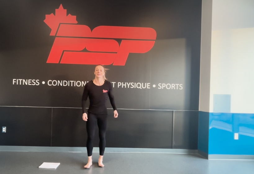 Fitness instructor doing exercise