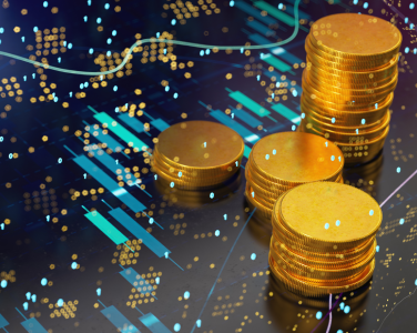 pièces de monnaie sur un fond avec des graphiques