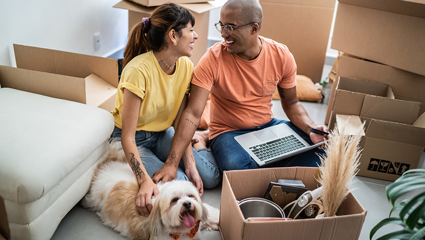 couple with moving boxes