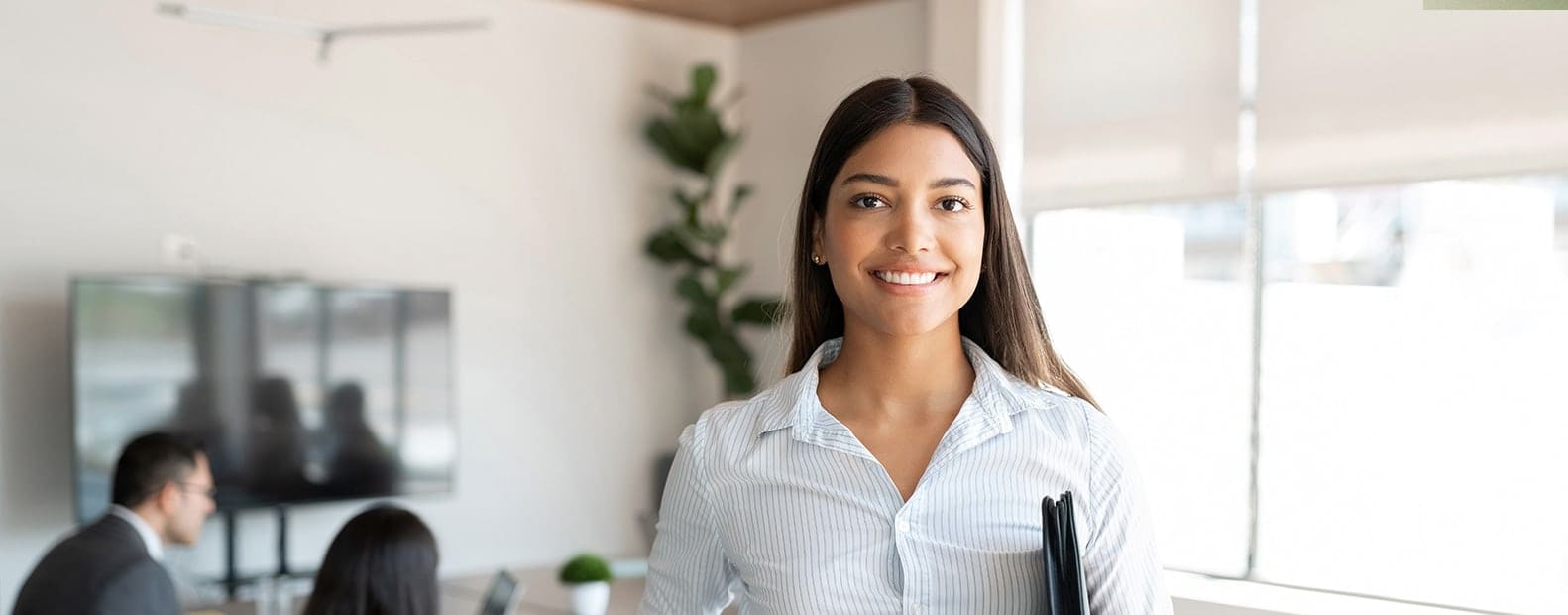 woman holding employment folder