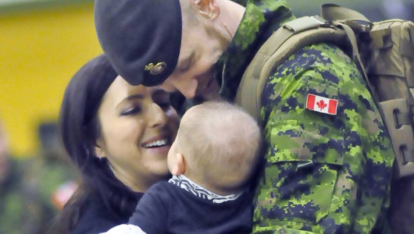 young military family with baby