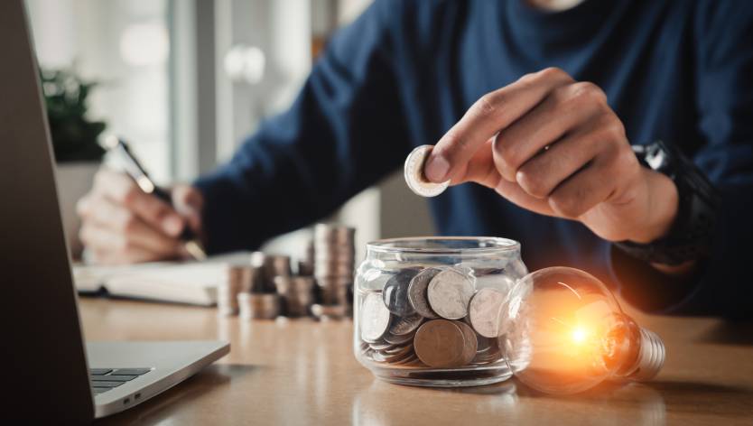 man on phone with coins