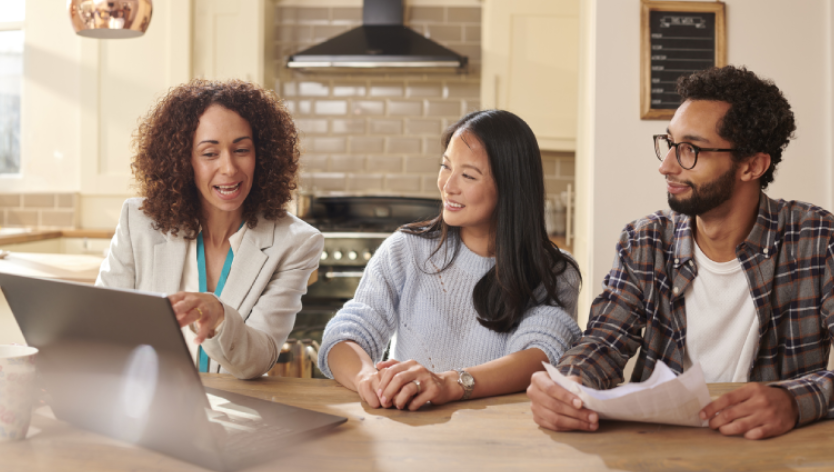 financial advisor with a man and a woman