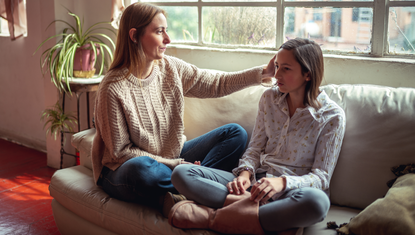 2 women on couch 