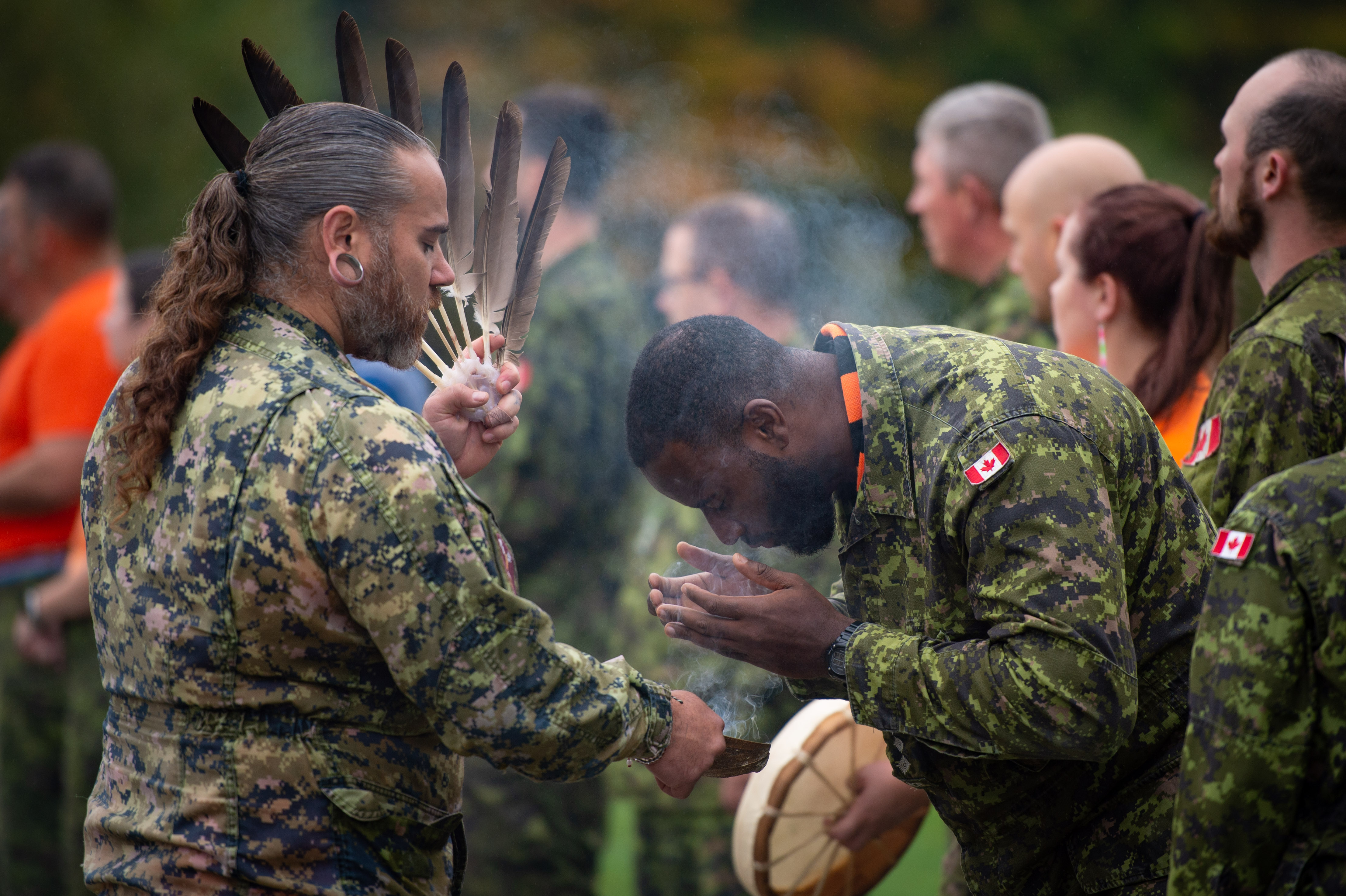 2 soldiers in a ceremony