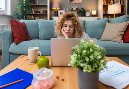 A woman in front of a computer
